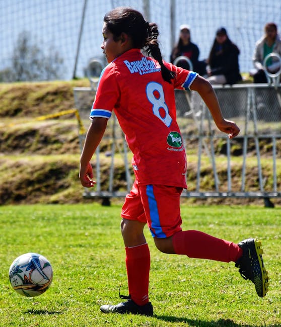Professional athlete wearing jersey number 8 on a soccer field